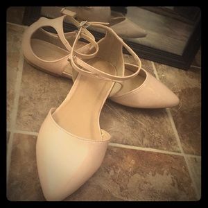 Nude point, buckle flats